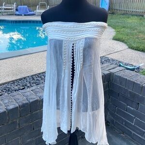 Lelo Off White Sheer top with front slit and pearl accents Small